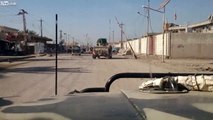 A suicide bomber blows himself up in front of the Iraqi army