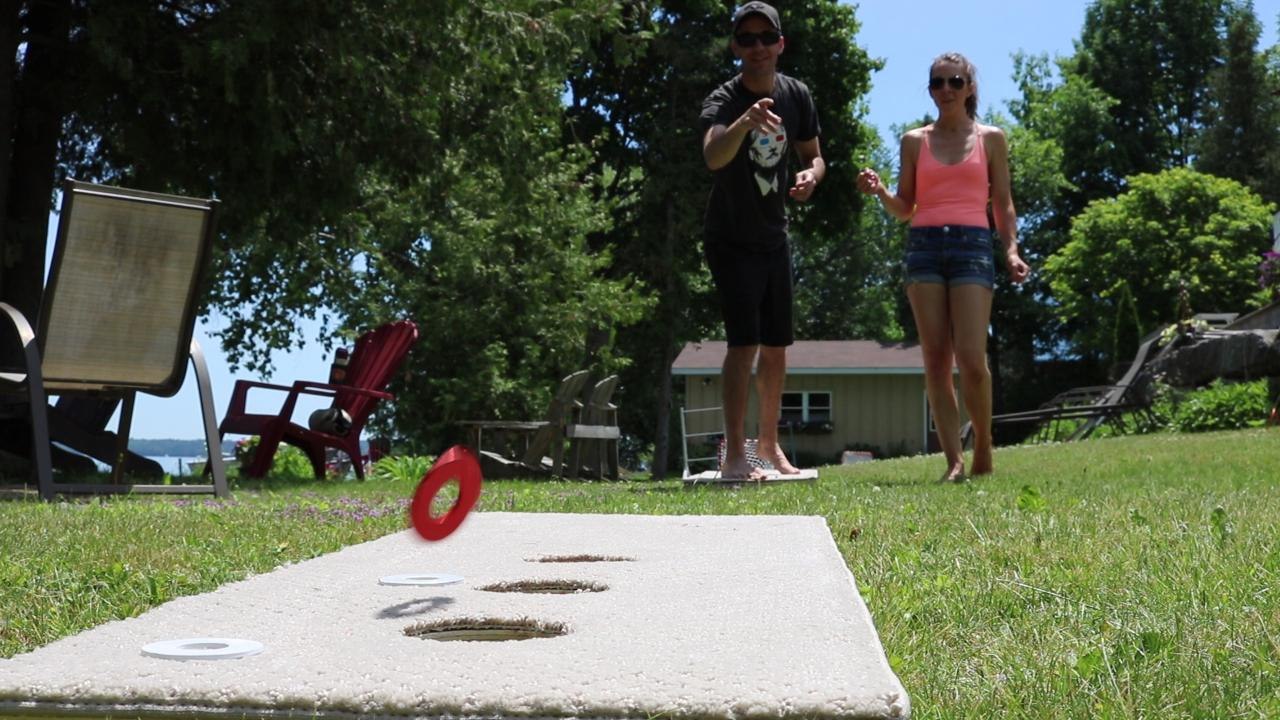 This DIY 3-hole washer toss cottage game is great for the whole family