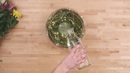Make this sweet firefly flower vase to brighten up your space