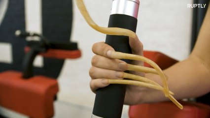 See woman with longest nails in Russia NAILING IT