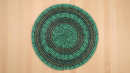 Upcycle your old garden hose into a no-slip outdoor mat
