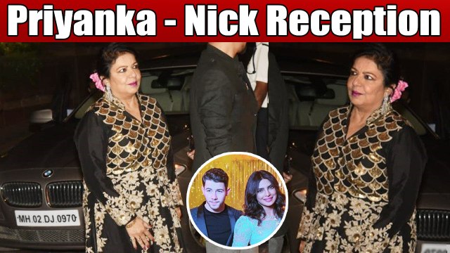 Priyanka Chopra & Nick Jonas Reception: Madhu Chopra opts for a black & gold dress | FilmiBeat