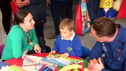 Leeds Rhinos Squad Present Giving To Children At The LGI!