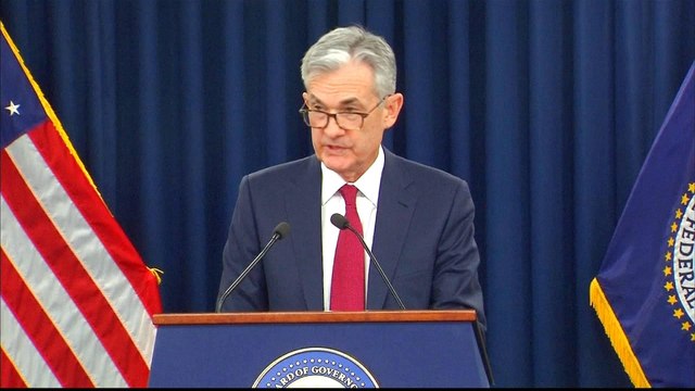 Federal Reserve hikes interest rates, defying pressure from Trump