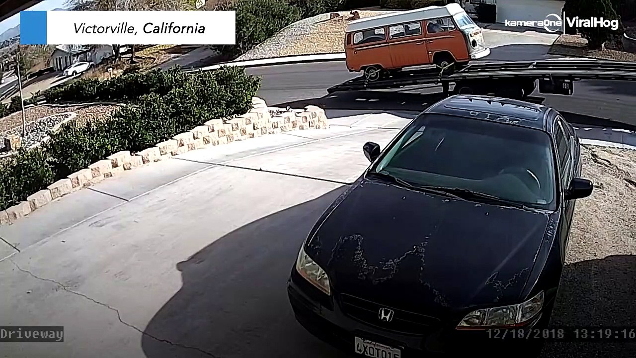 Man hases runaway trailer down hill