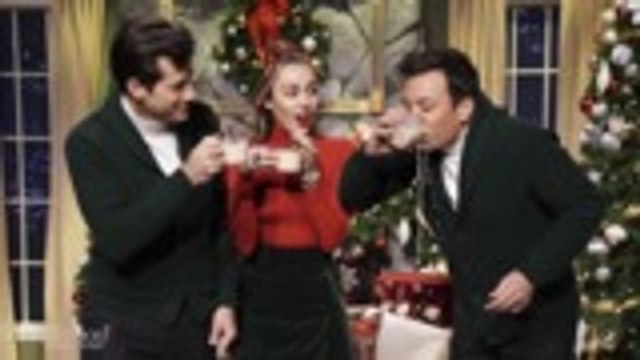 Miley Cyrus Performs 'Santa Baby' With Feminist Take on 'Tonight Show' | THR News
