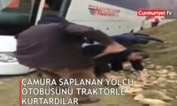 Çamura saplanan yolcu otobüsünü traktörle kurtardılar