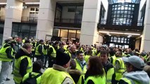 Yellow vest protesters enter town hall and sing French national anthem