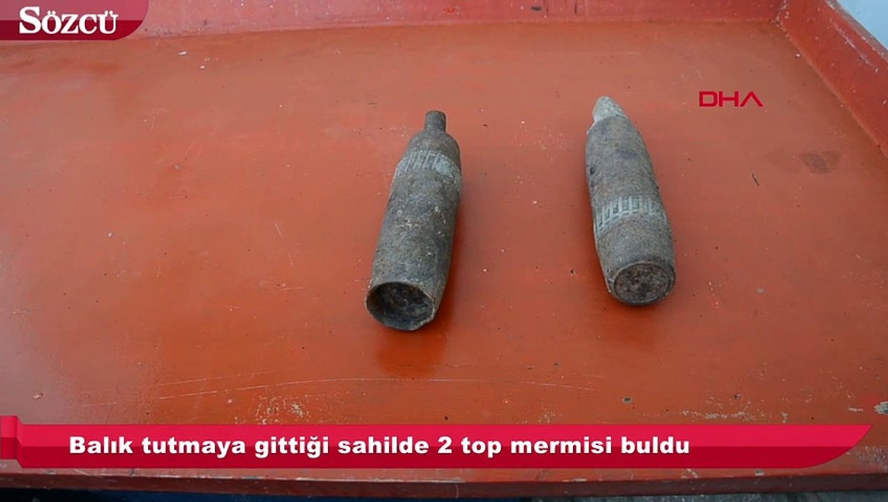 Balık tutmaya gittiği sahilde 2 top mermisi buldu