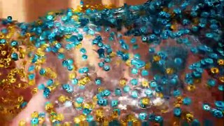 Mixing Sequins into Clear Slime
