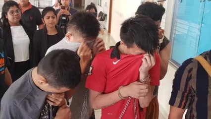 Four charged with murder of transgender woman