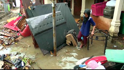 As Indonesia volcano rumbles, survivors fear more ruinous waves