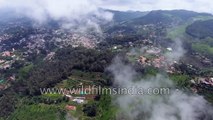 Coonoor town with tea gardens, with clouds moving in over Nilgiri hills