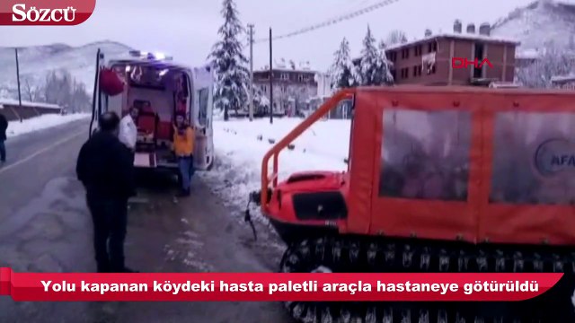 Yolu kapanan köydeki hasta, paletli kurtarma aracıyla hastaneye götürüldü