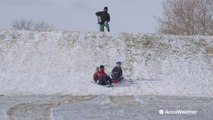 Residents enjoy snow and frigid cold in New Mexico