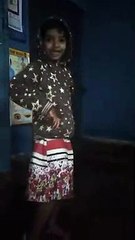 Girl dancing at home.