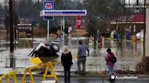 Terrifying video of car sinking, driver escapes just in time