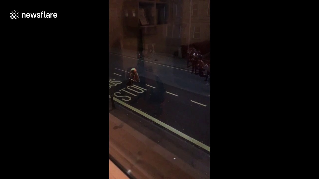 Hilarious! UK students cheer as road painter finishes the last letter of "Bus Stop"