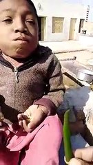 amazing video of  little boy to eat Green pepper