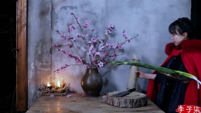 Chinese girl - chinese food-cooking fish in traditional Chinese way