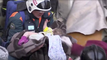 Watch: 'Miracle baby' pulled from rubble as number of dead in building collapse rises to 21