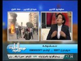 متظاهرون يحرقون سيارة شرطة وسيارة خاصة بميدان التحرير