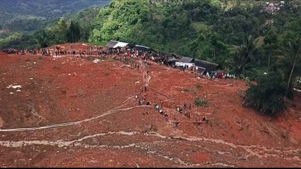 Indonesia resumes rescue work as landslide death toll rises