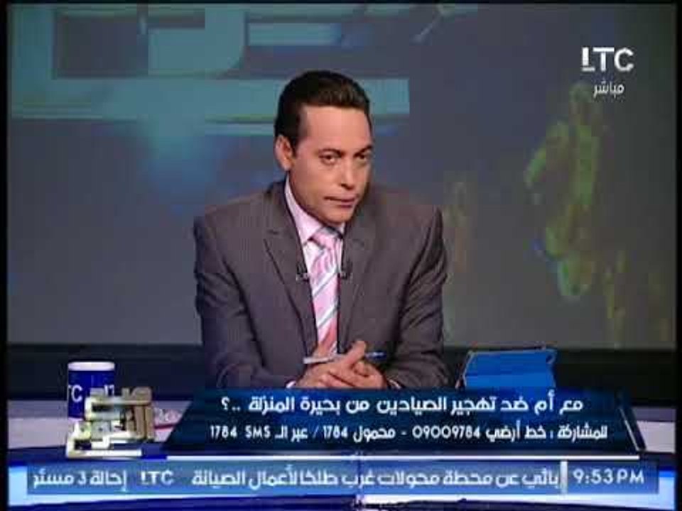 احد الصيادين بحيرة المنزله تعتبر ثانى اكبر بحيره سمكيه فى العالم