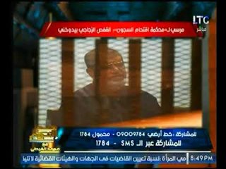 تعليق ساخر من الغيطي حول طلب "مرسي" بخروجه من القفص الزجاجي