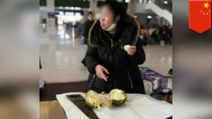 Woman inhales whole durian because she can't bring it on train