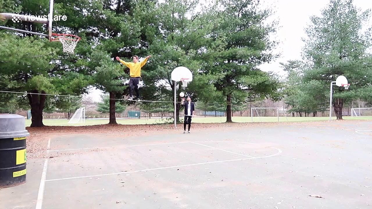 Incredible slackline backflip trickshot scores a basket