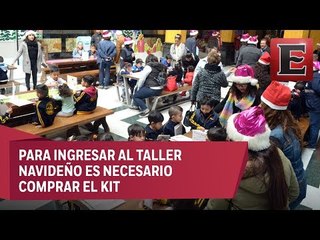 Niños mandan su carta a Santa en Palacio Postal