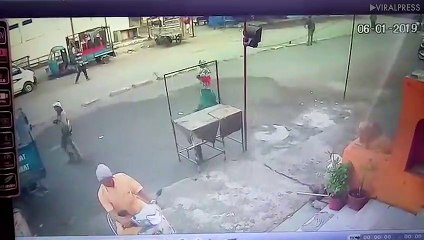 Indian Woman Picks Herself Up After Truck Reverses Over Her