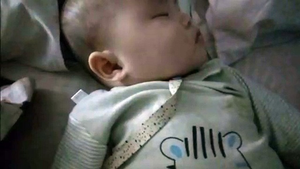 Baby dreaming about sucking