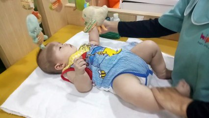 This baby knows to relax like a boss at baby spa