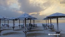Rare snow blankets the beaches of Greece