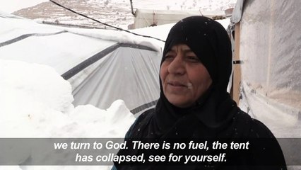 Syrian refugees in Lebanon camps suffer heavy snowfall