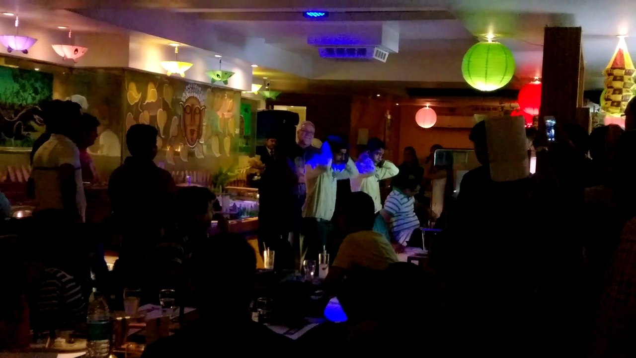 Waiting staff dancing in Lungi Dance and Pungi baja kar in barbeque nation, gurgaon.