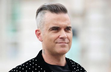 Robbie Williams dreams of Tom Cruise