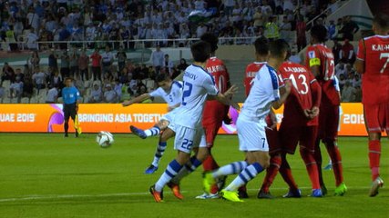 Uzbekistan captain Odil Ahmedov curls sublime free-kick around the wall