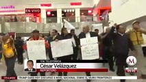 Empleados del AICM marchan en la Terminal 1