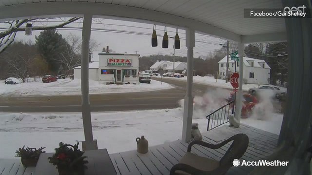 Scary scene as car loses control on snowy road, hits house