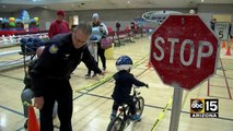 Officers teaching kids bike safety for free in Phoenix