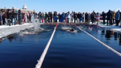 Swimmers brave the icy waters of Saint Petersburg