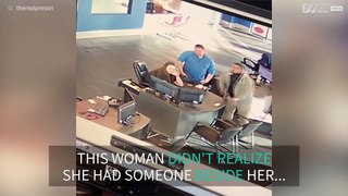 Woman is so scared she falls from chair!