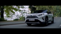 The new Toyota RAV4 Hybrid Driving in the country