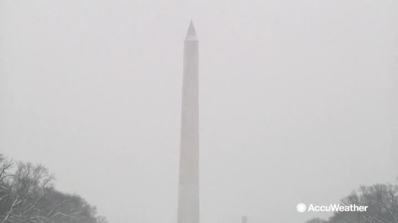 Tourists enjoy snowy day in the nation's capital