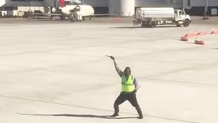 Airline Worker Dances On Tarmac To Cheer Up Sad Passenger