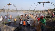 Hundreds fish in Indian lake to celebrate harvest