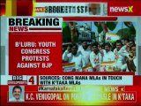 Youth Congress workers protest outside Haryana resort where Karnataka BJP MLAs are lodged